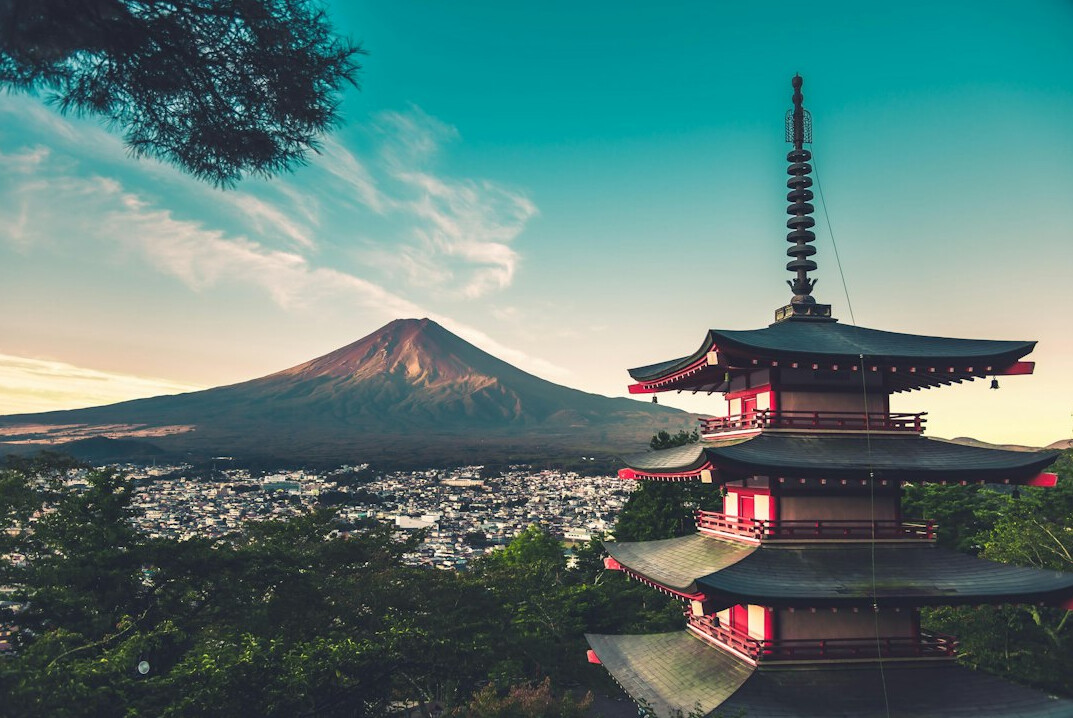 Japanese pagoda with Mount Fuji in the background